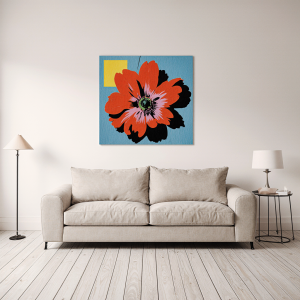 Minimalist living room featuring a large colorful Andy Warhol Flower print as the central statement piece above a neutral sofa.